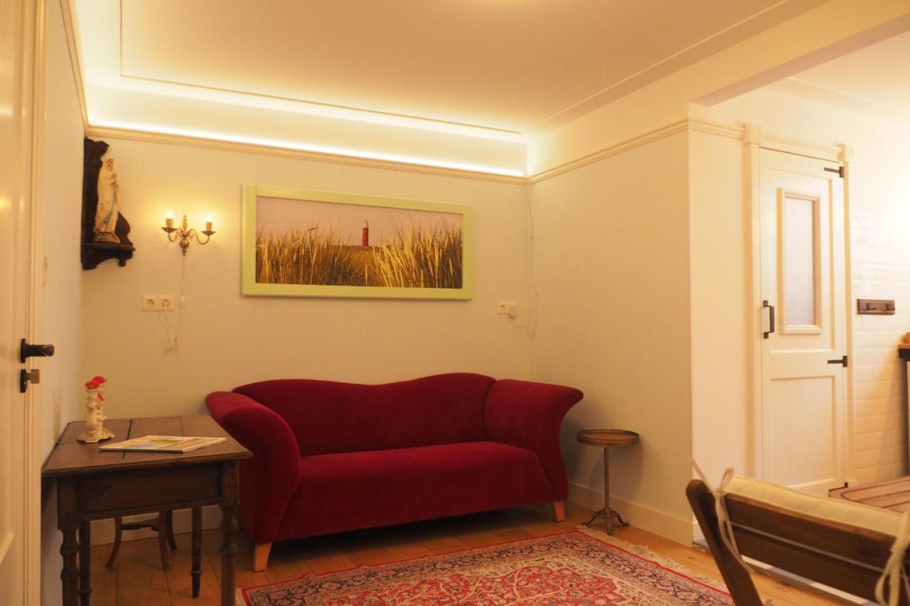 B&B Bureau Warmoesstraat Den Burg Bagian luar foto